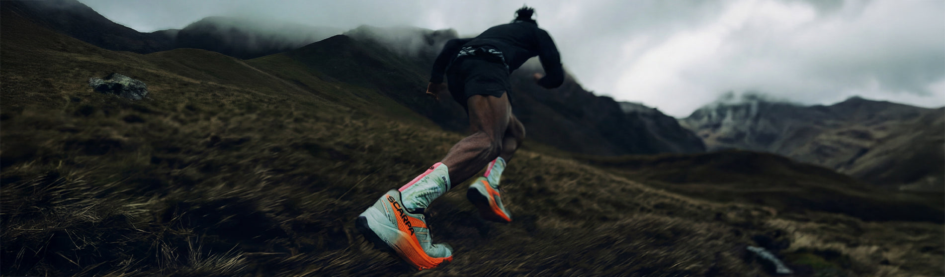 Helio Fumo trail running with SCARPA's Spin Ultra 2 shoes