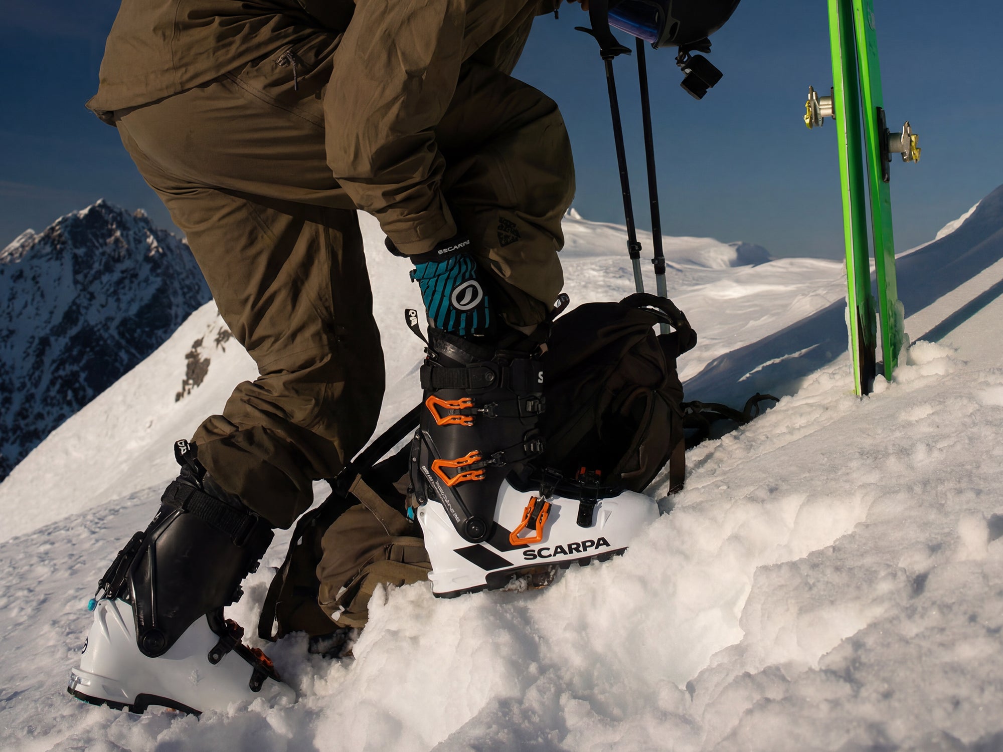 Close-up outdoor shot of a skier in a snowy mountain setting his pair of SCARPA's Maestrale RS ski mountaineering boots.