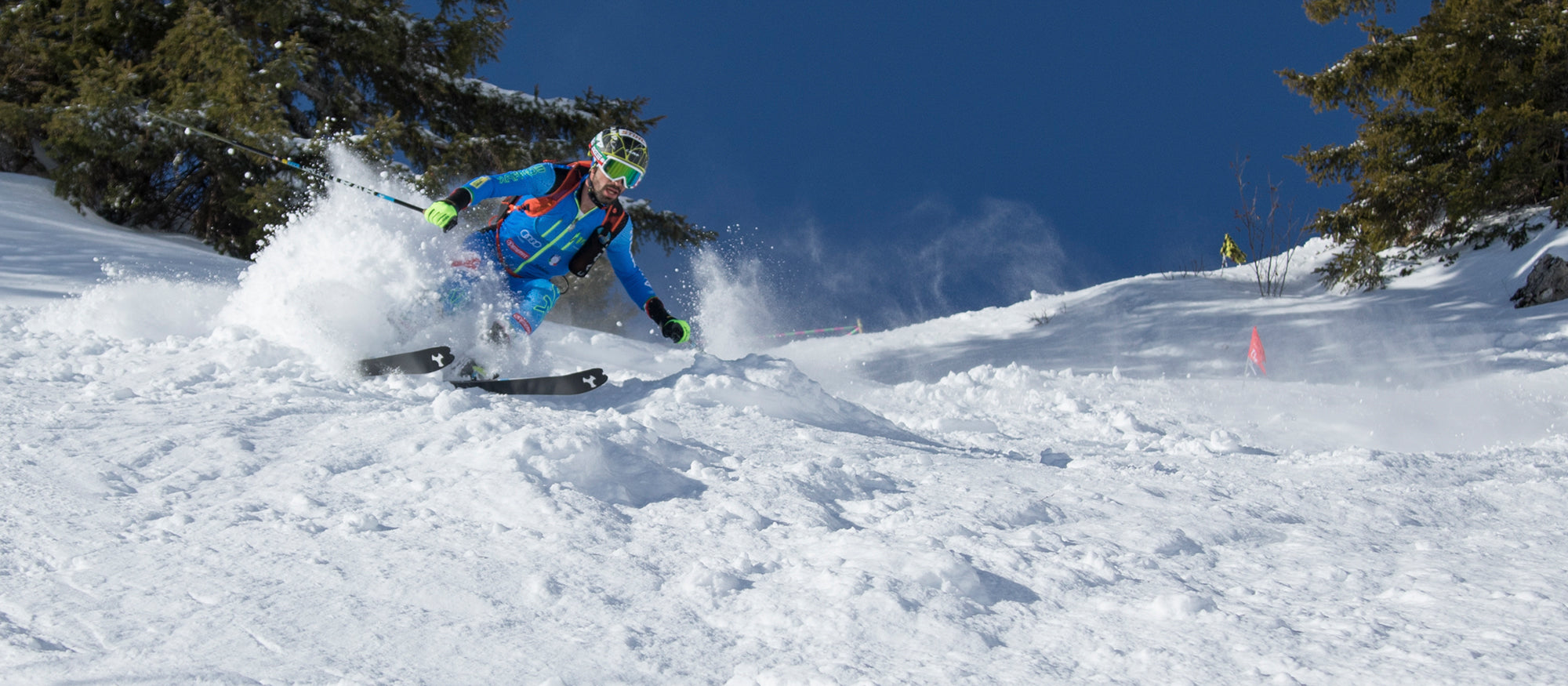Robert Antonioli making a turn on a snowy slope with Alien 4.0