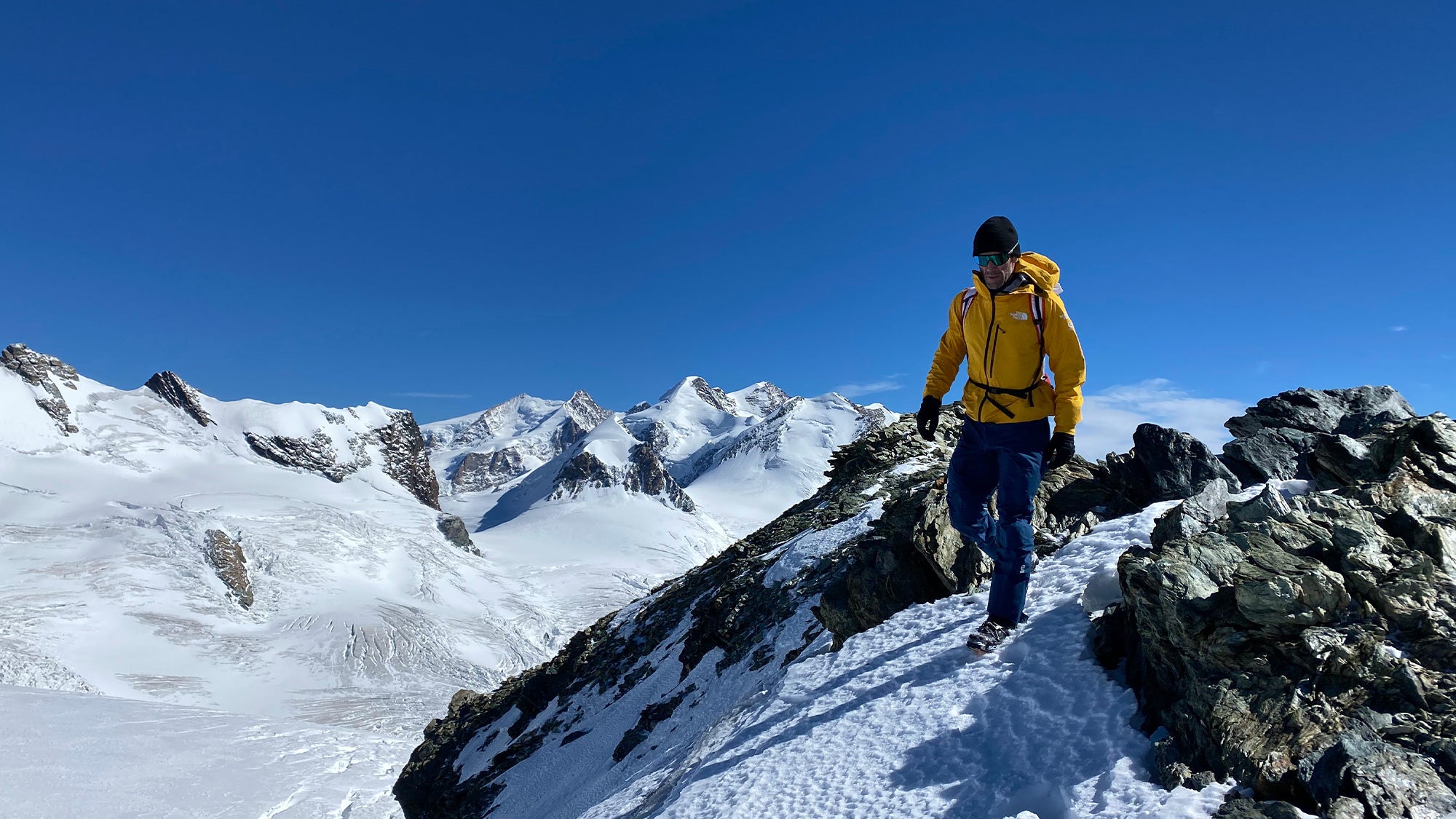 Hervè Barmasse Scarpa athlete at the top