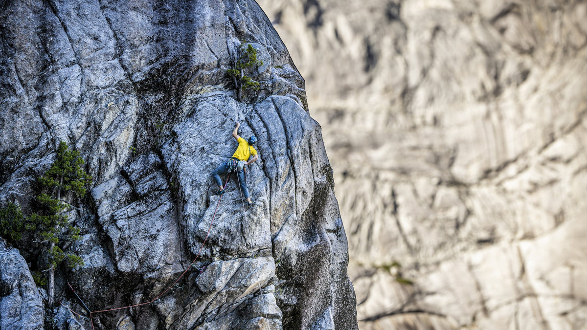 Jernej Kruder climbing a granite wall during the Cochamó 2026 expedition