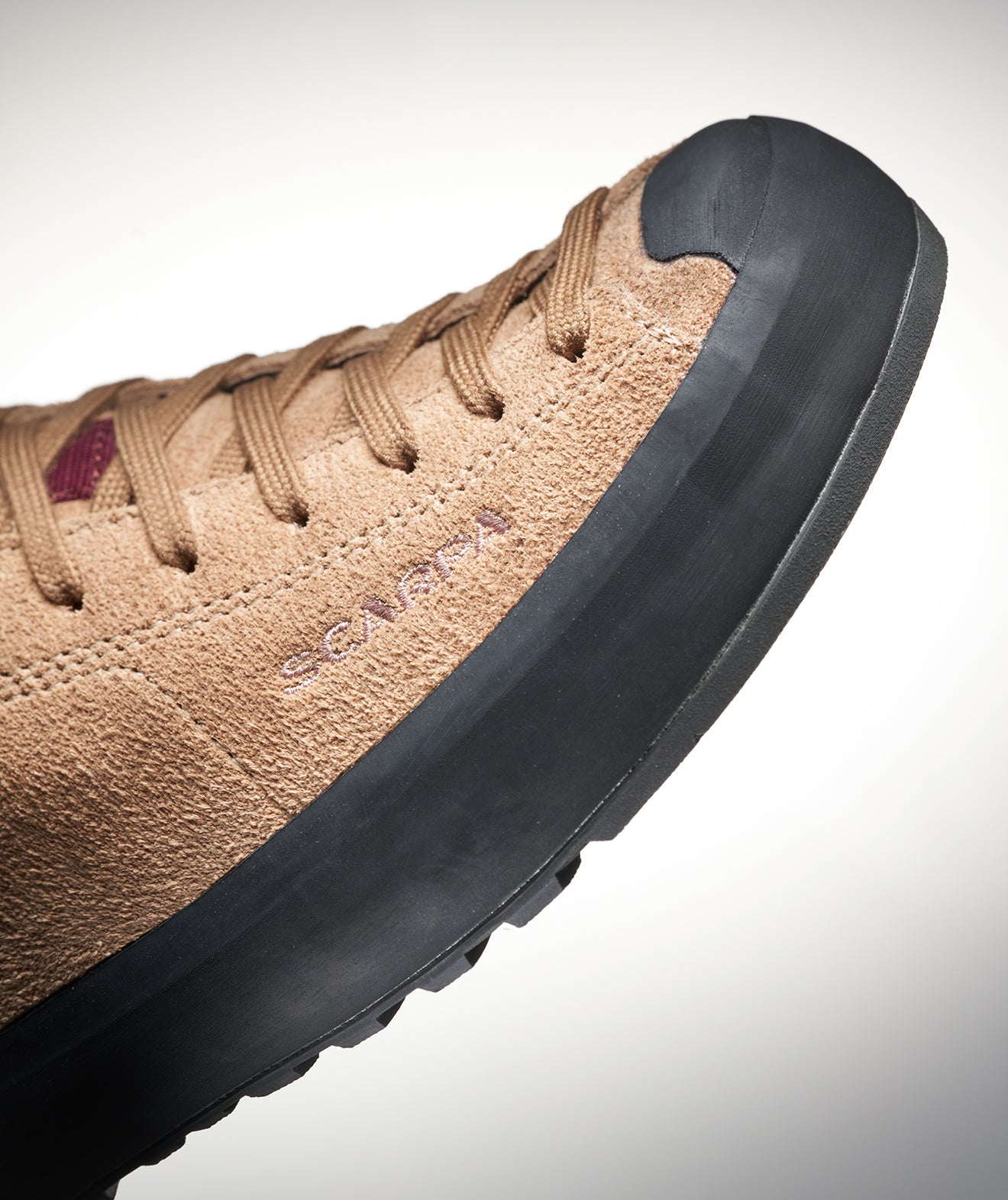 Close-up of the hand-applied rand on SCARPA's Mojito WRAP GTX.