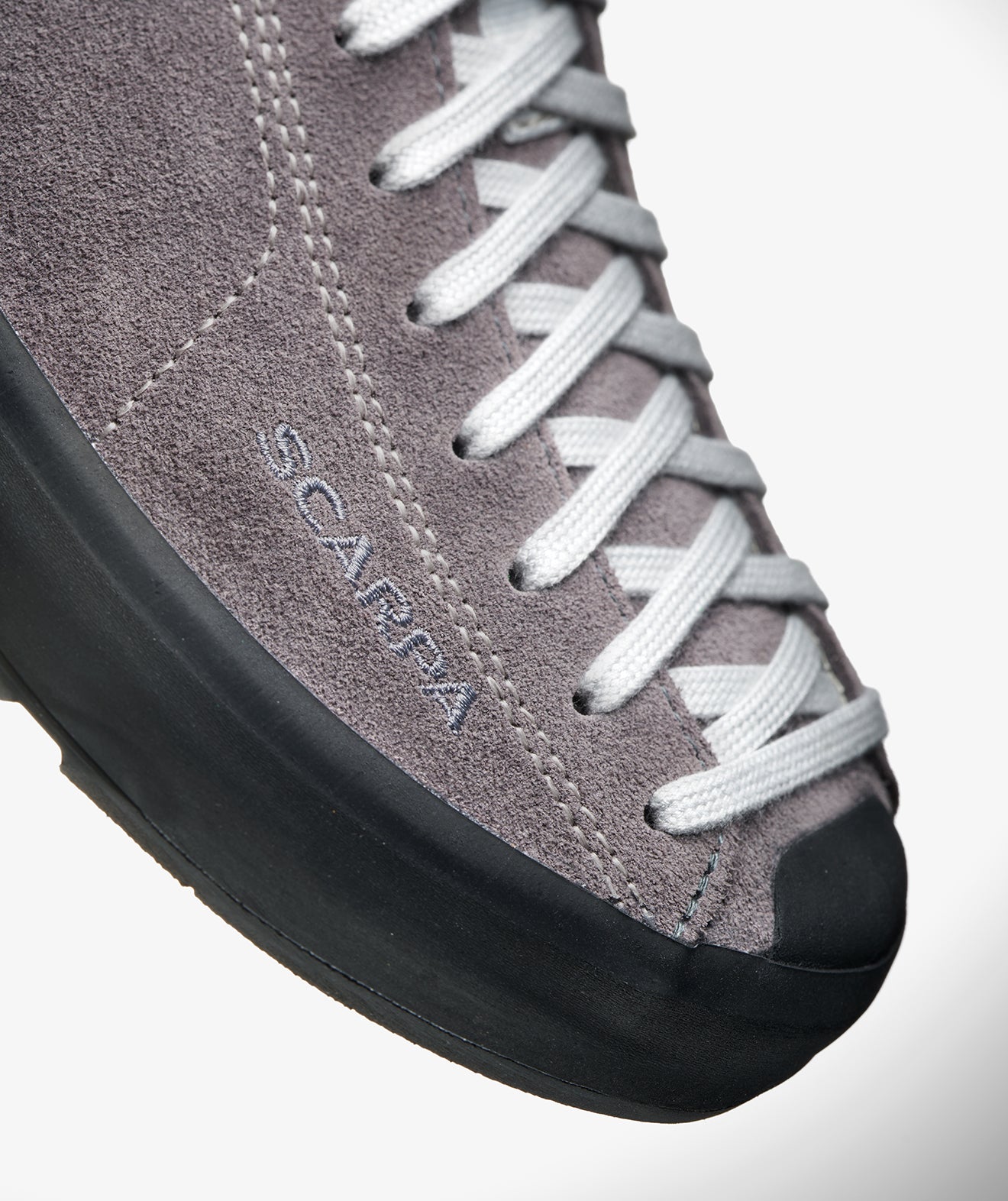 Close-up of the hand-applied rand on SCARPA's Mojito WRAP.