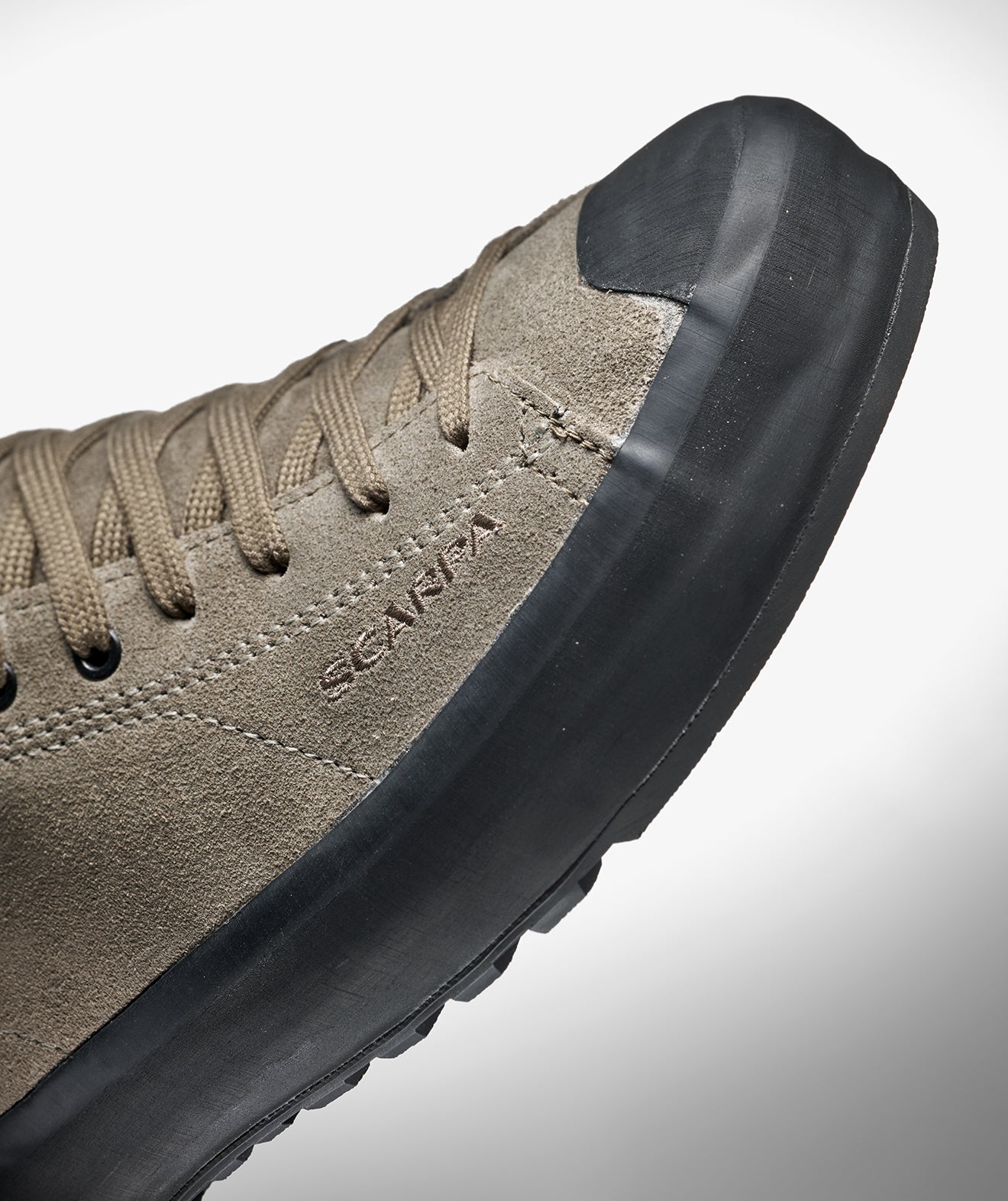 Close-up of the hand-applied rand on SCARPA's Mojito WRAP MID GTX