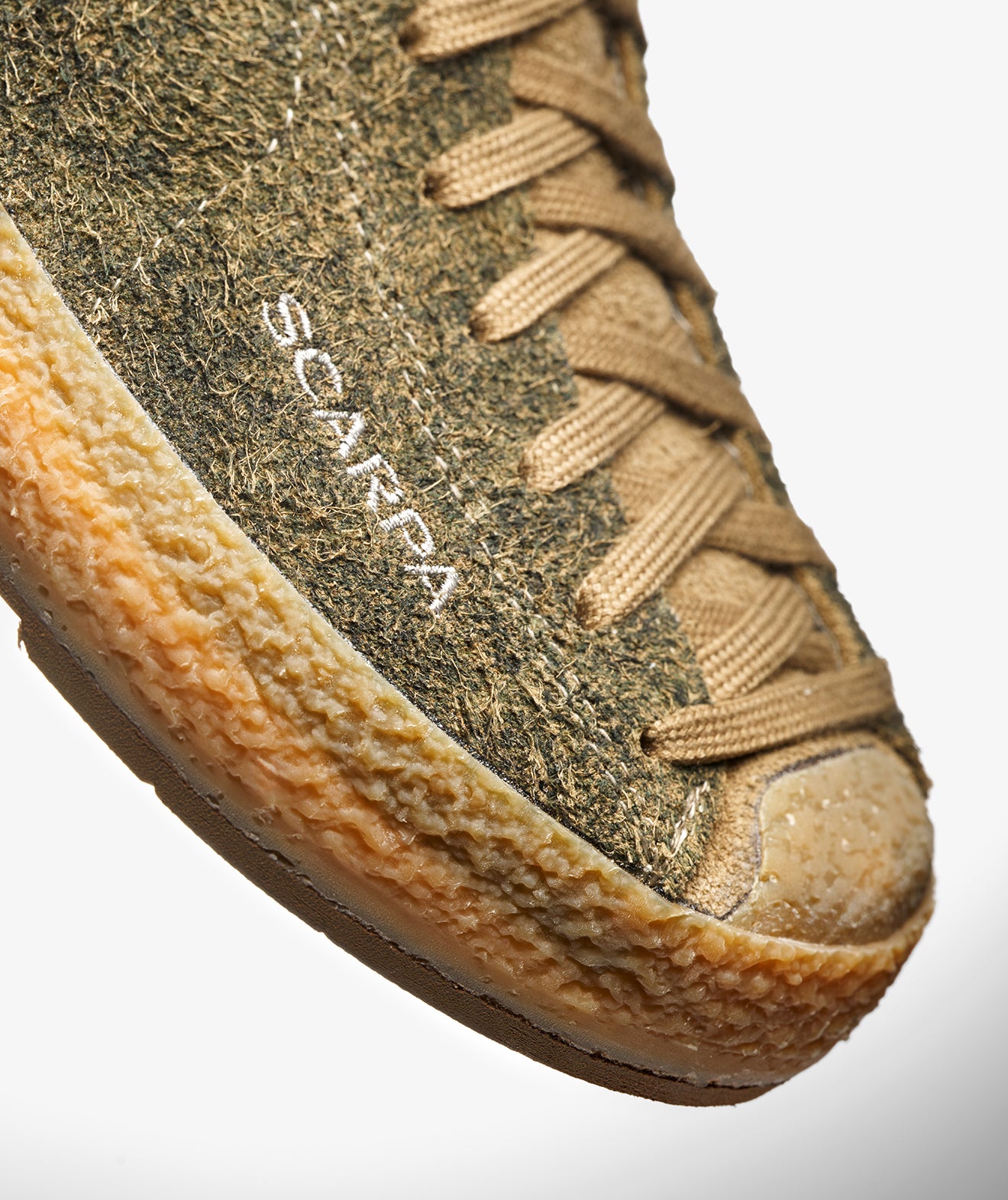 Close-up of the hand-applied rand on SCARPA's Mojito Wrap F