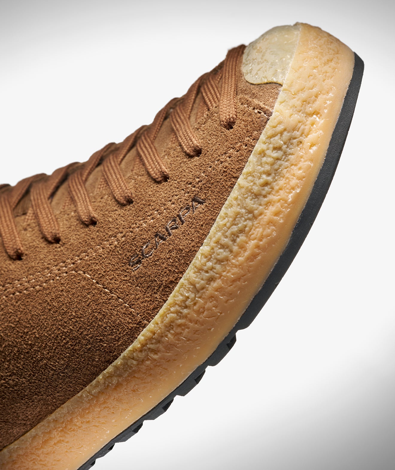 Close-up of the hand-applied rand on SCARPA's Mojito Wrap LL