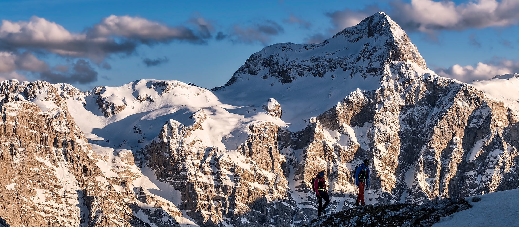 Climbers on snowy mountain peaks wearing Mont Blanc Pro GTX