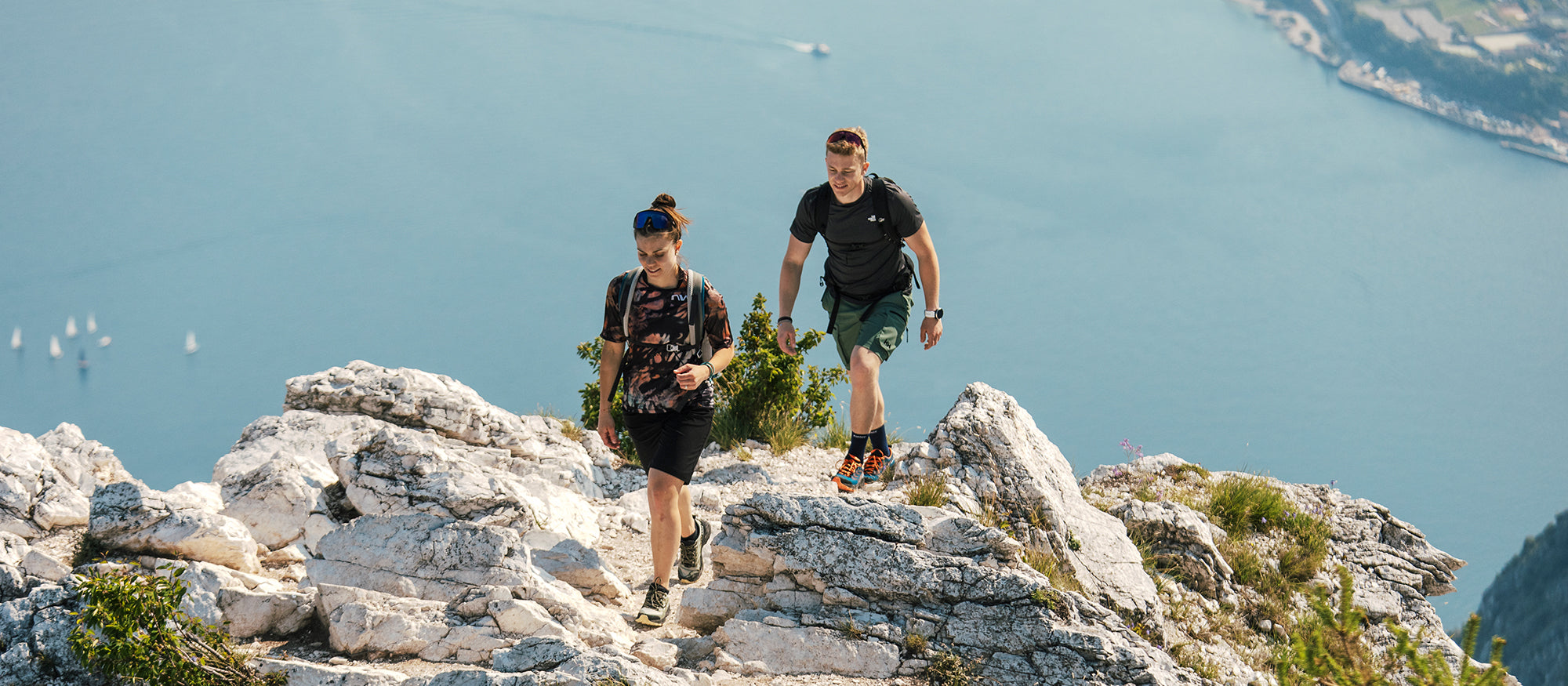 Hikers on a mountain trail wearing Rush 2 GTX