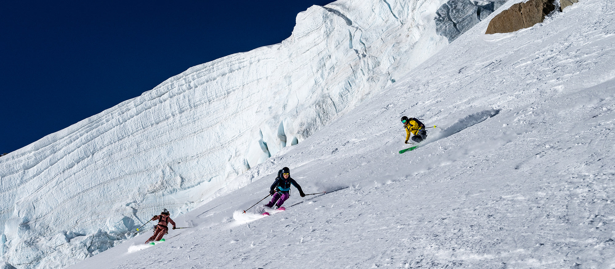 Giulia Monego descending a snowy mountain slope with GEA boots