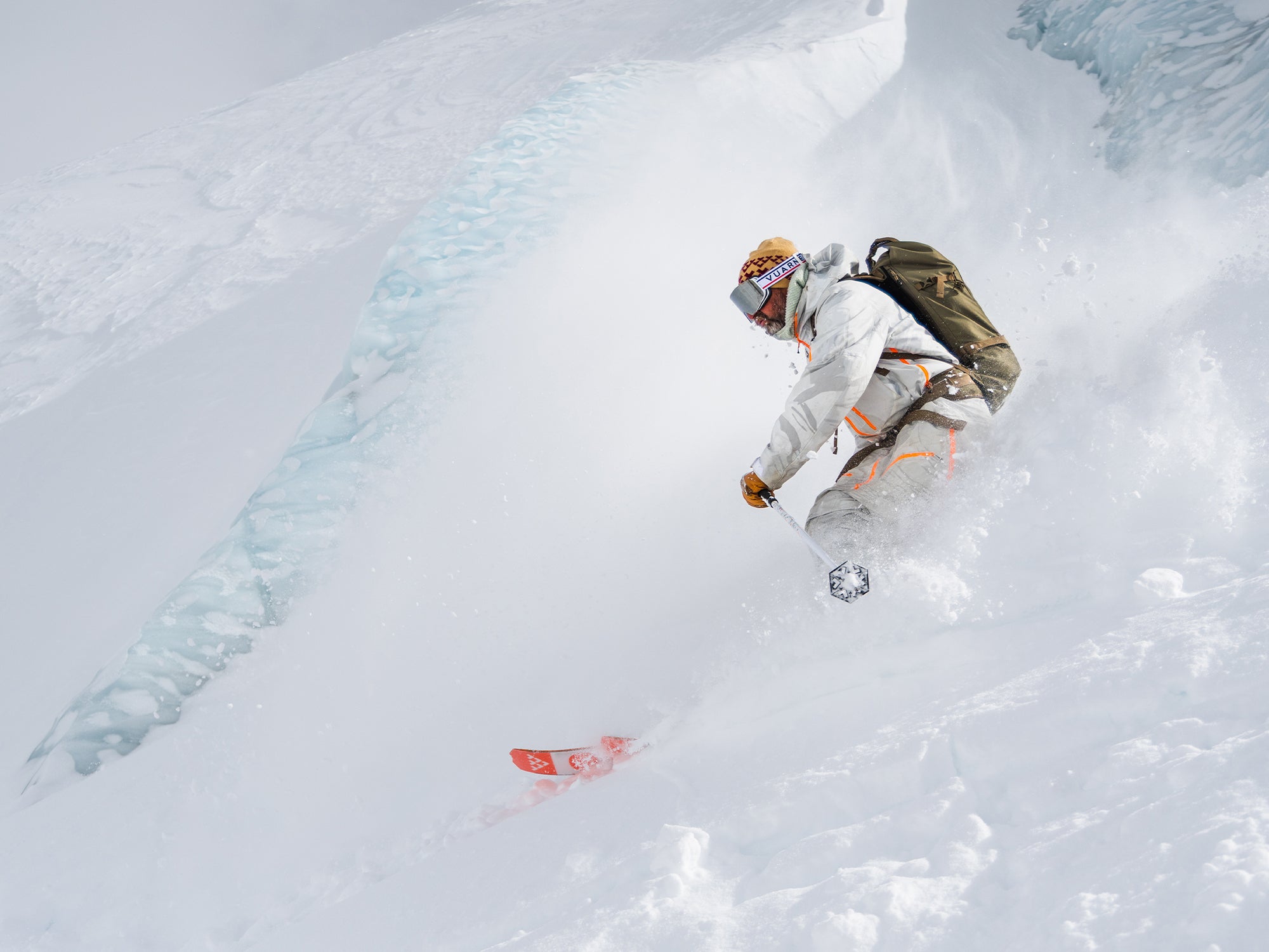 Bruno Compagnet carving through deep powder snow on a steep slope, with SCARPA's Maestrale ski mountaineering boots.