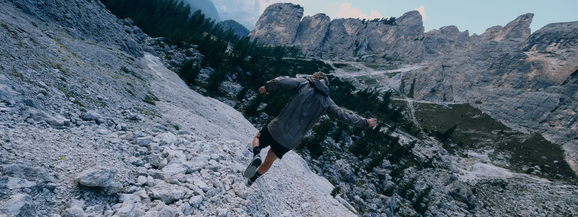 A trail runner wearing SCARPA Ribelle Run 2 GTX trail running shoes.