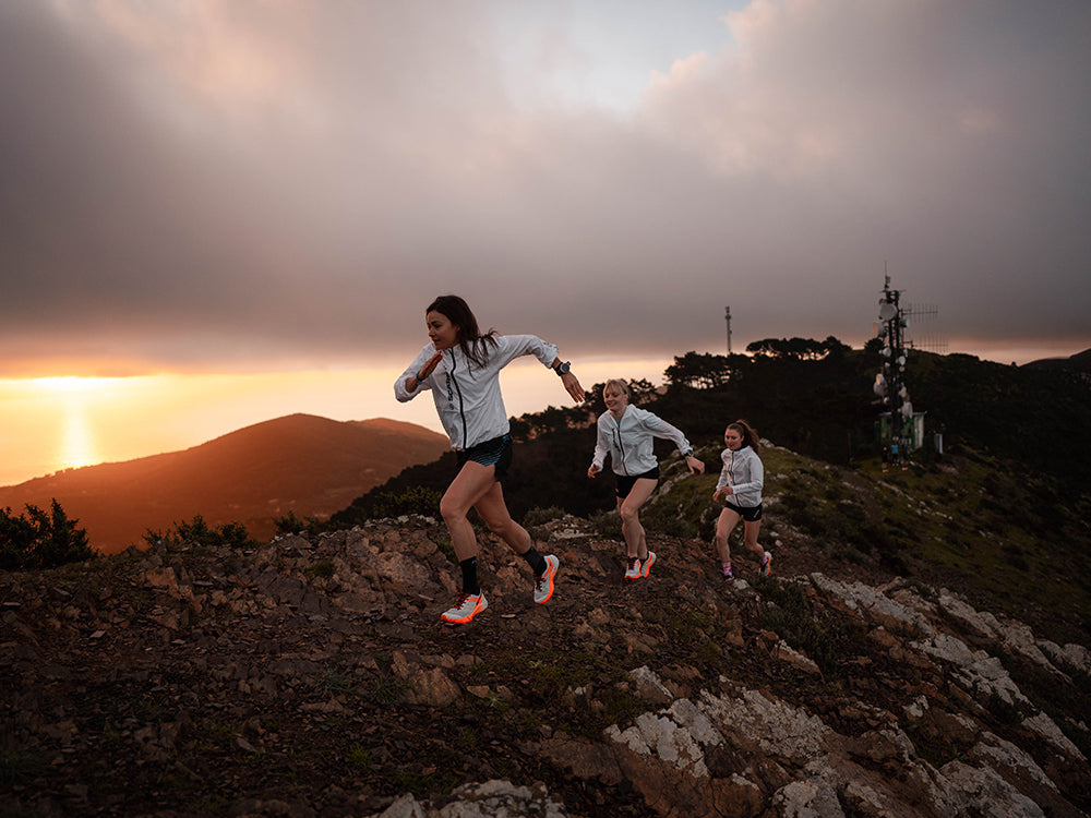 SCARPA women trail running team run during the sunset wearing Spin Ultra 2 shoes