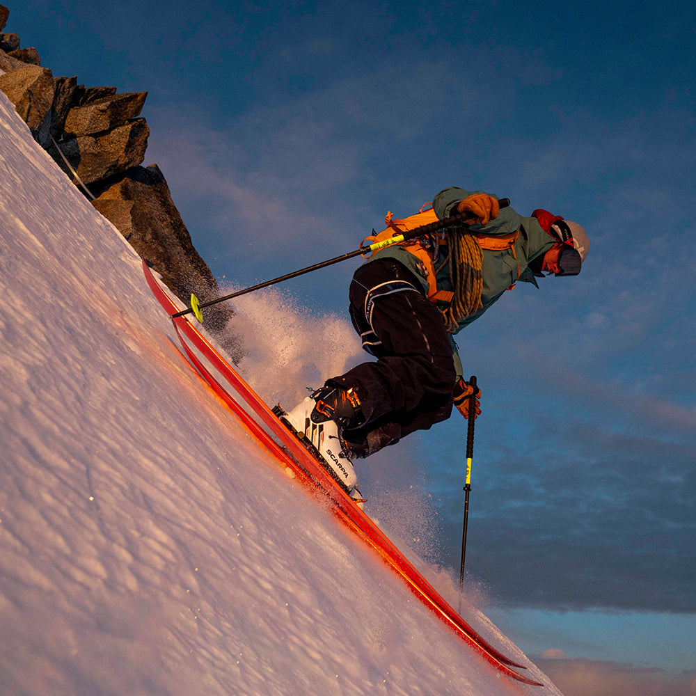 Damien Arnaud skiing in Chamonix during sunrise