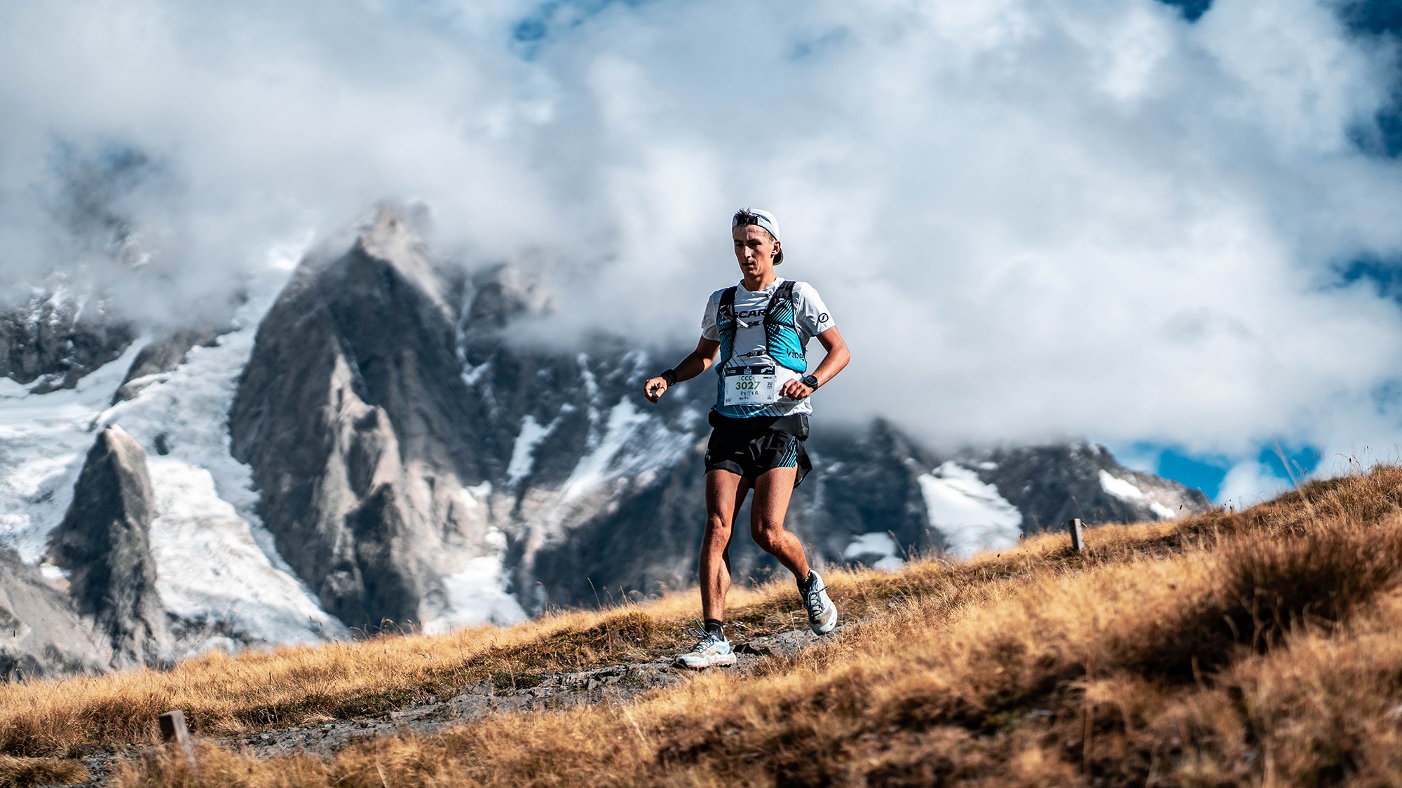 Peter Frano running through mountains he loves