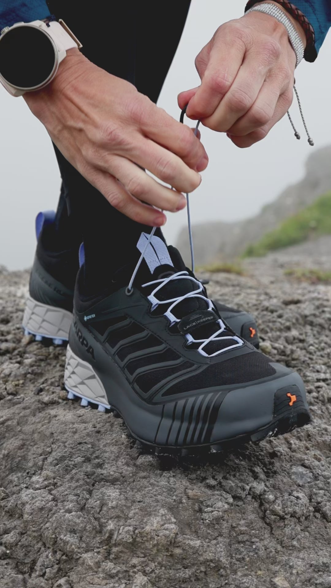 Runner wearing Ribelle Run 2 GTX Trail running shoes